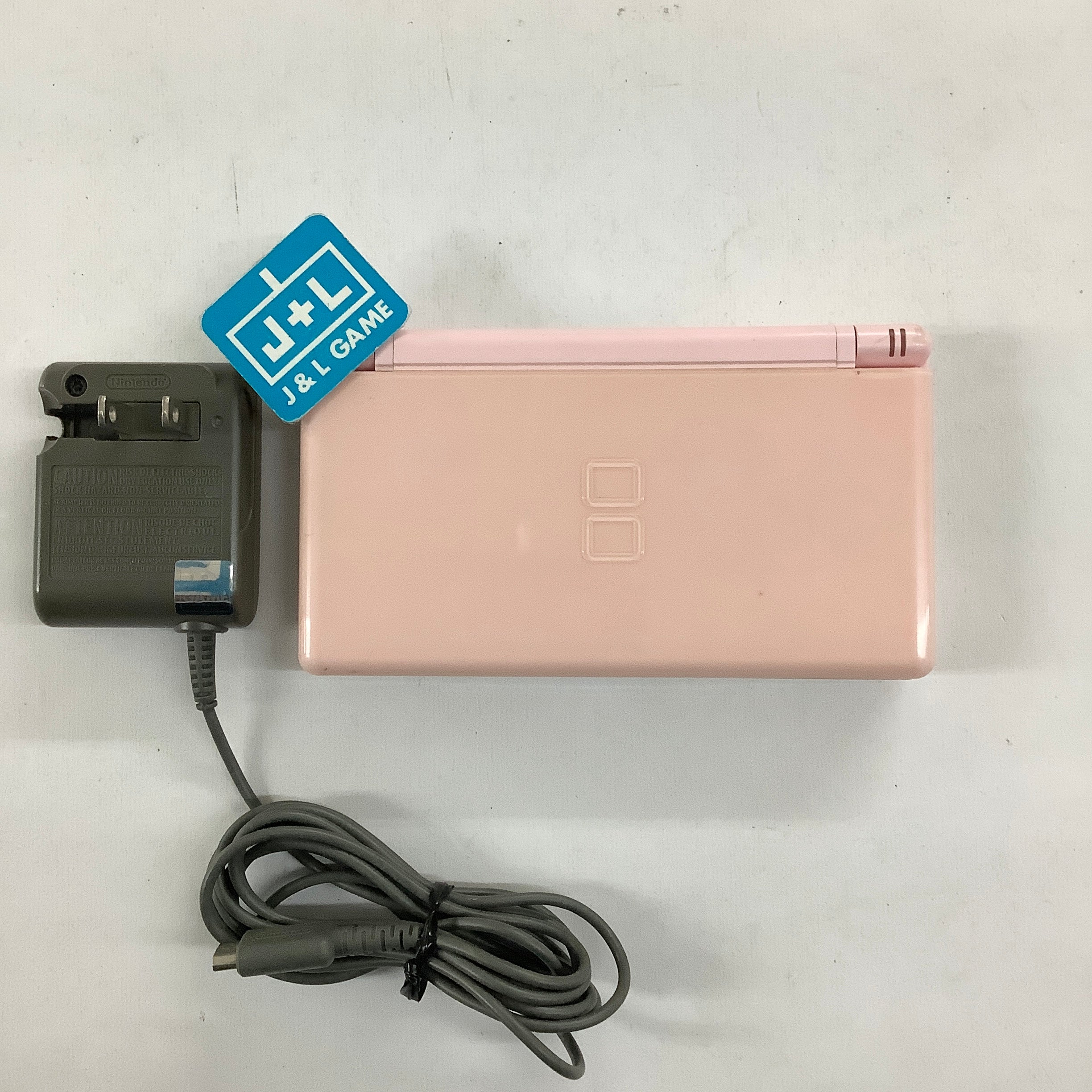 Nintendo DS outlet Lite in Coral/Pink