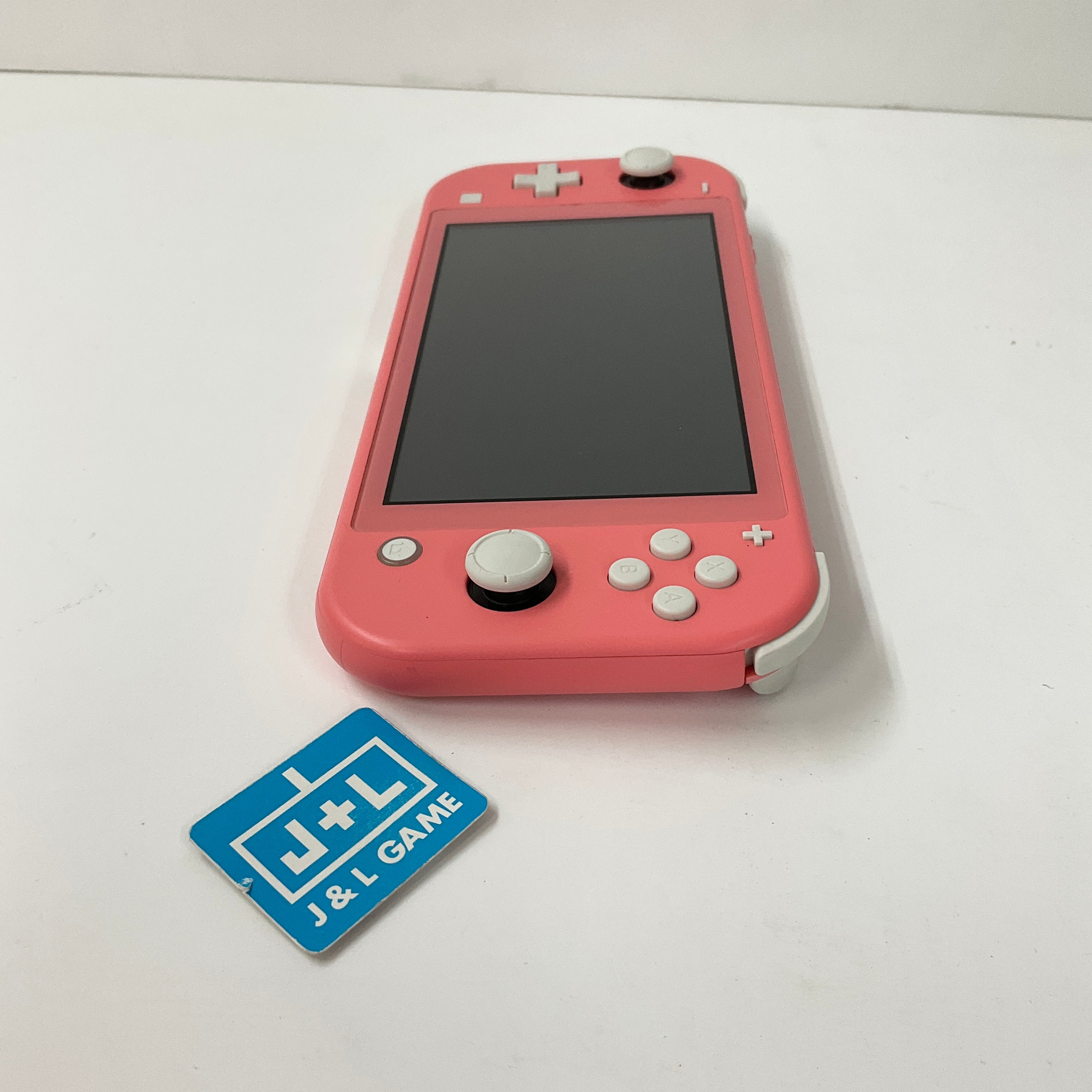 Nintendo switch coral sales pink pre order